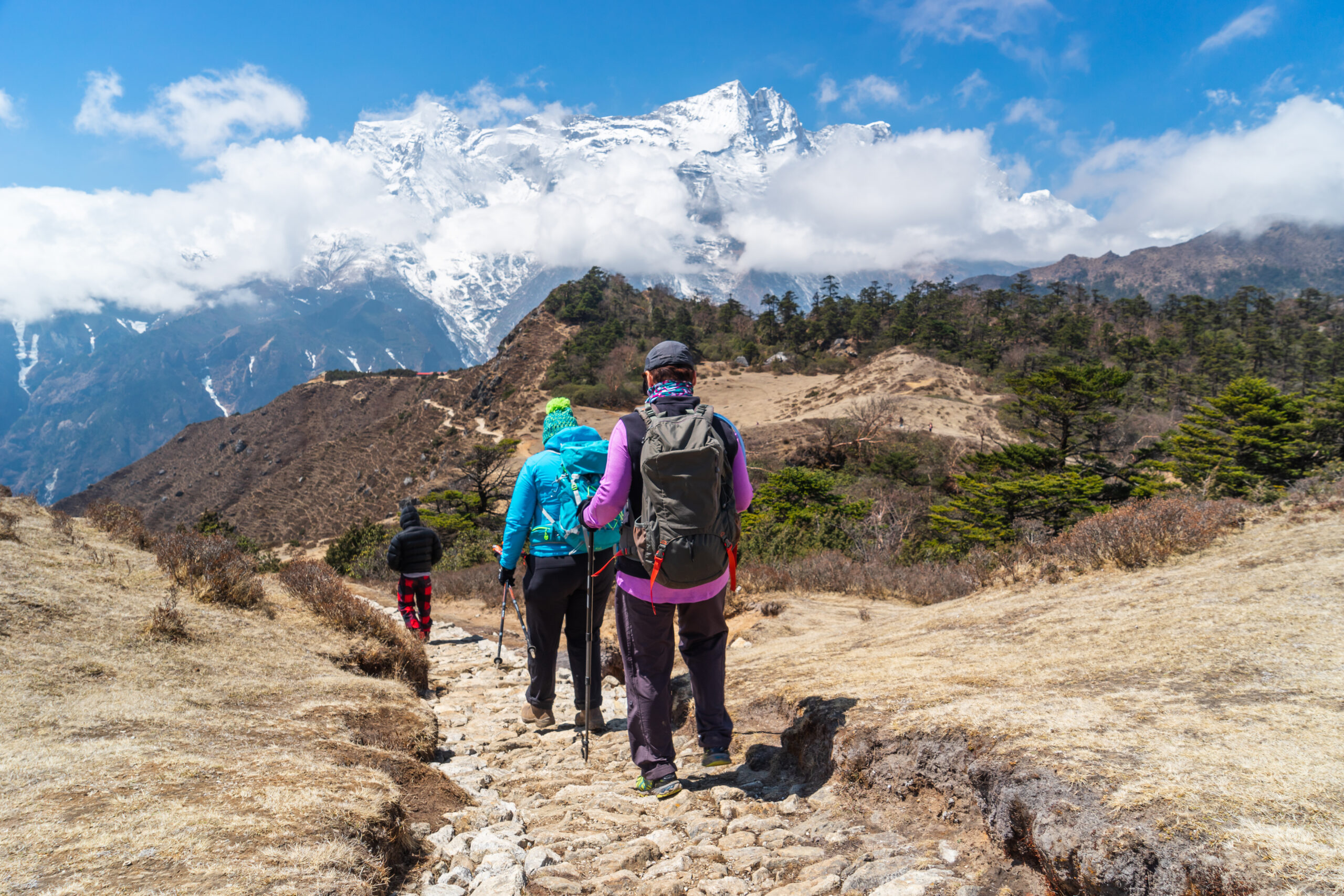 Trekkers,Walking,On,Everest,Base,Camp,Trekking,Trail,,Himalaya,Mountains