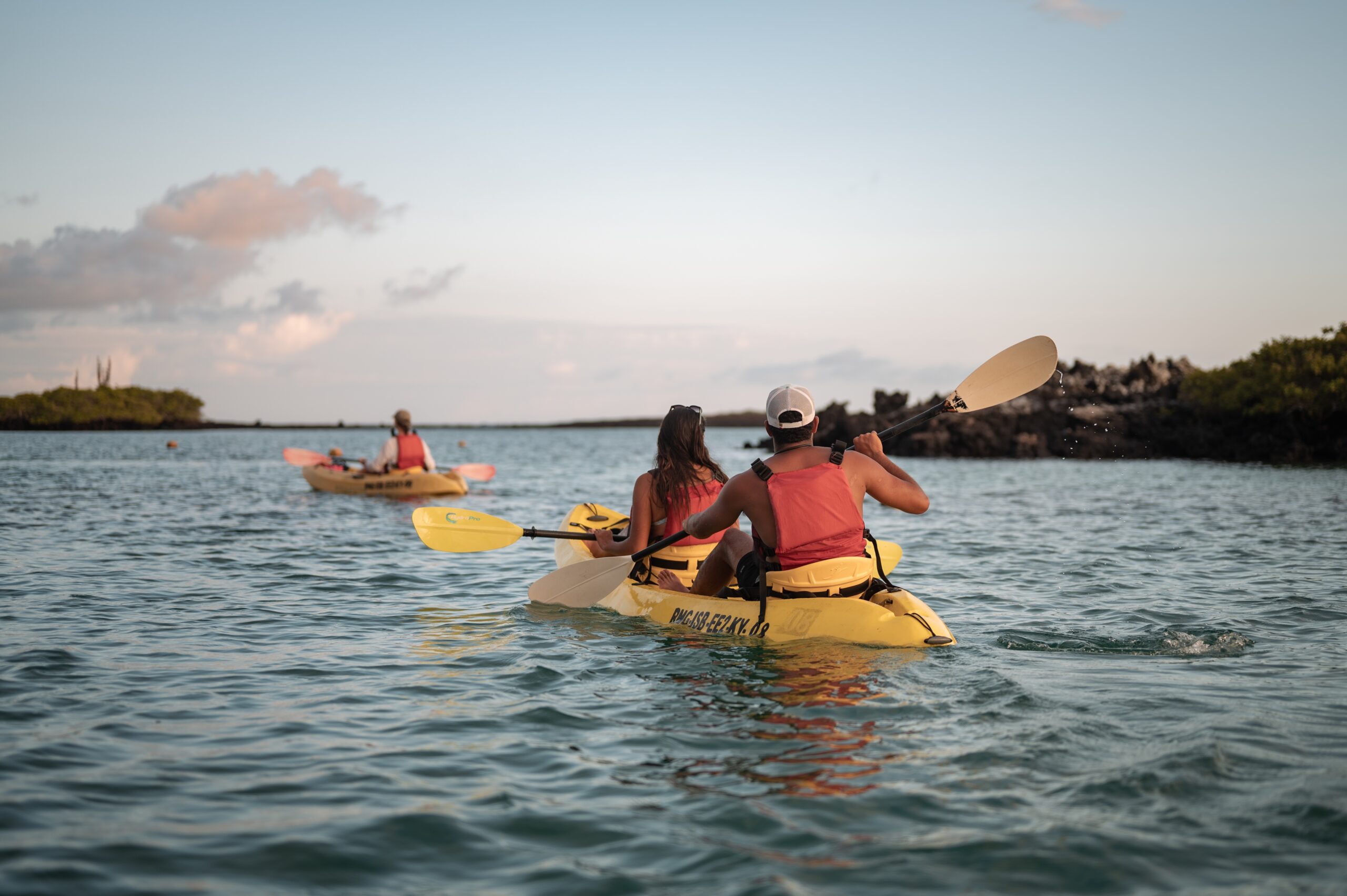 Kayaking,During,Sunset,On,The,Ocean,In,Galapagos