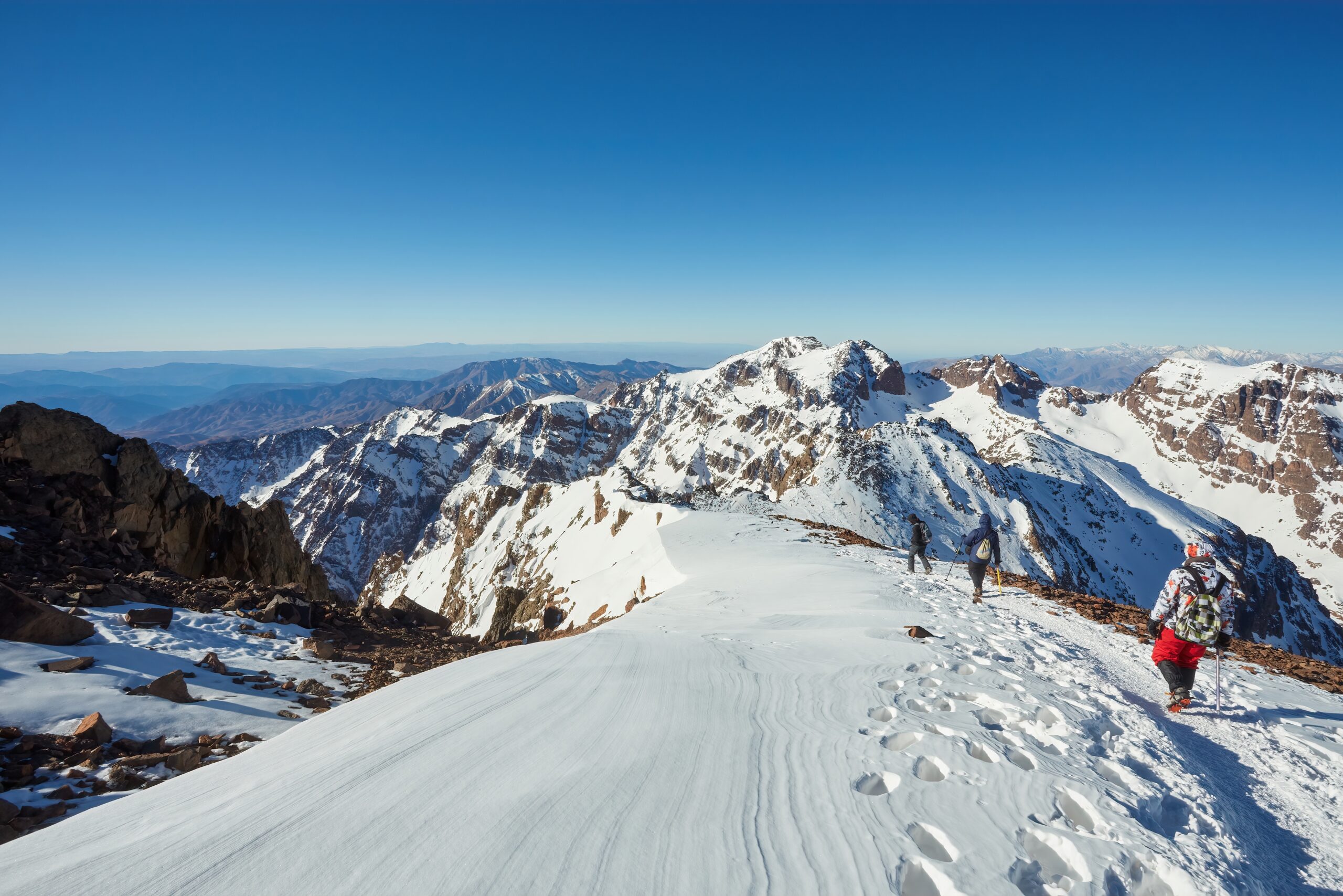 A,Triumphant,Tourist,At,The,Peak,Of,Mount,Toubkal,,Morocco,