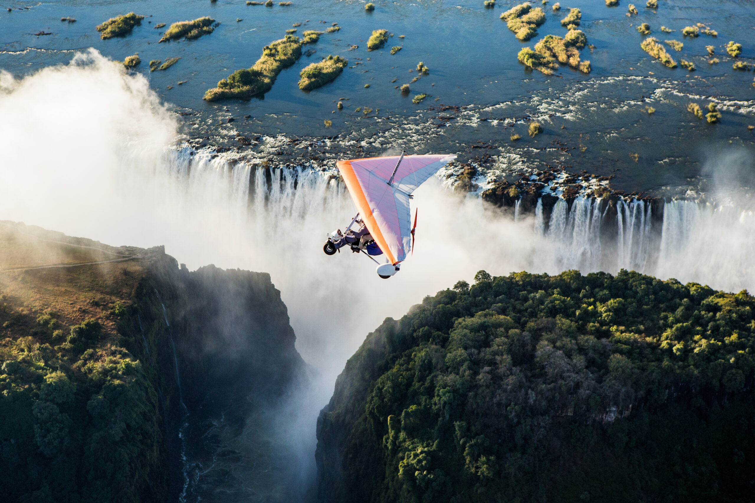 Zambia,,Victoria,Falls,,Africa,Â??,18,July:,Tourists,Fly,Over